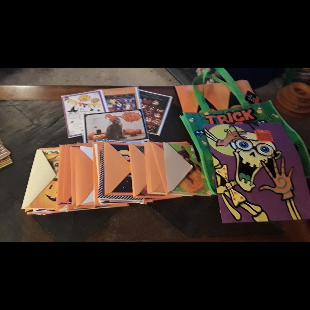 60 Halloween greeting cards mostly Hallmark and 3 Halloween bags included